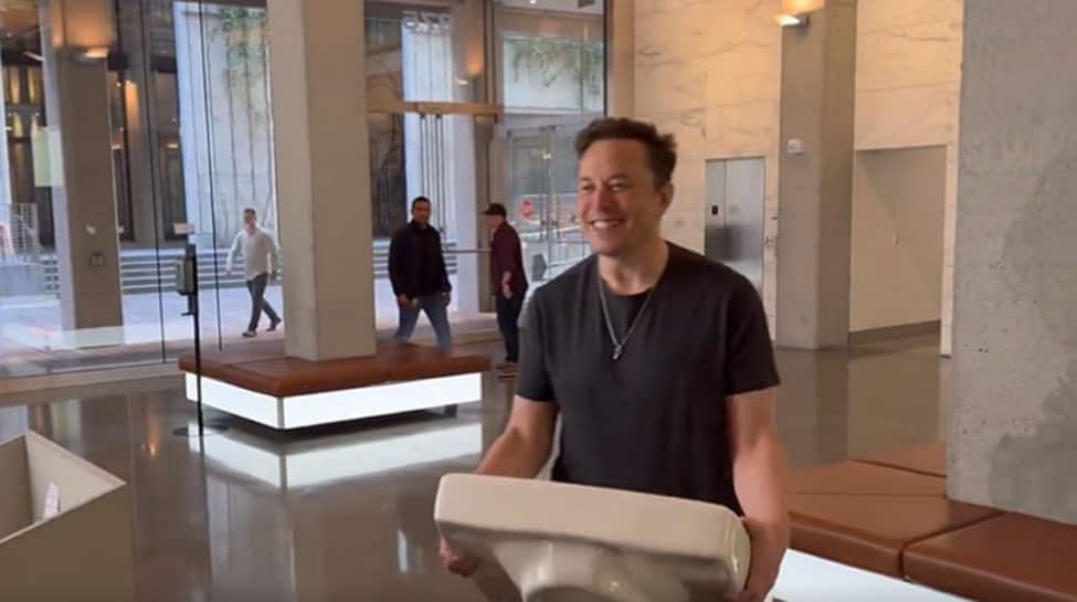 Elon Musk enters Twitter headquarters carrying a sink, ahead of Friday deadline to close $44 billion deal 