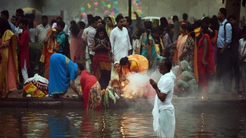 WATCH: Devotees gather in Kalindi Ghat in Delhi, offer prayers on Chhath Puja