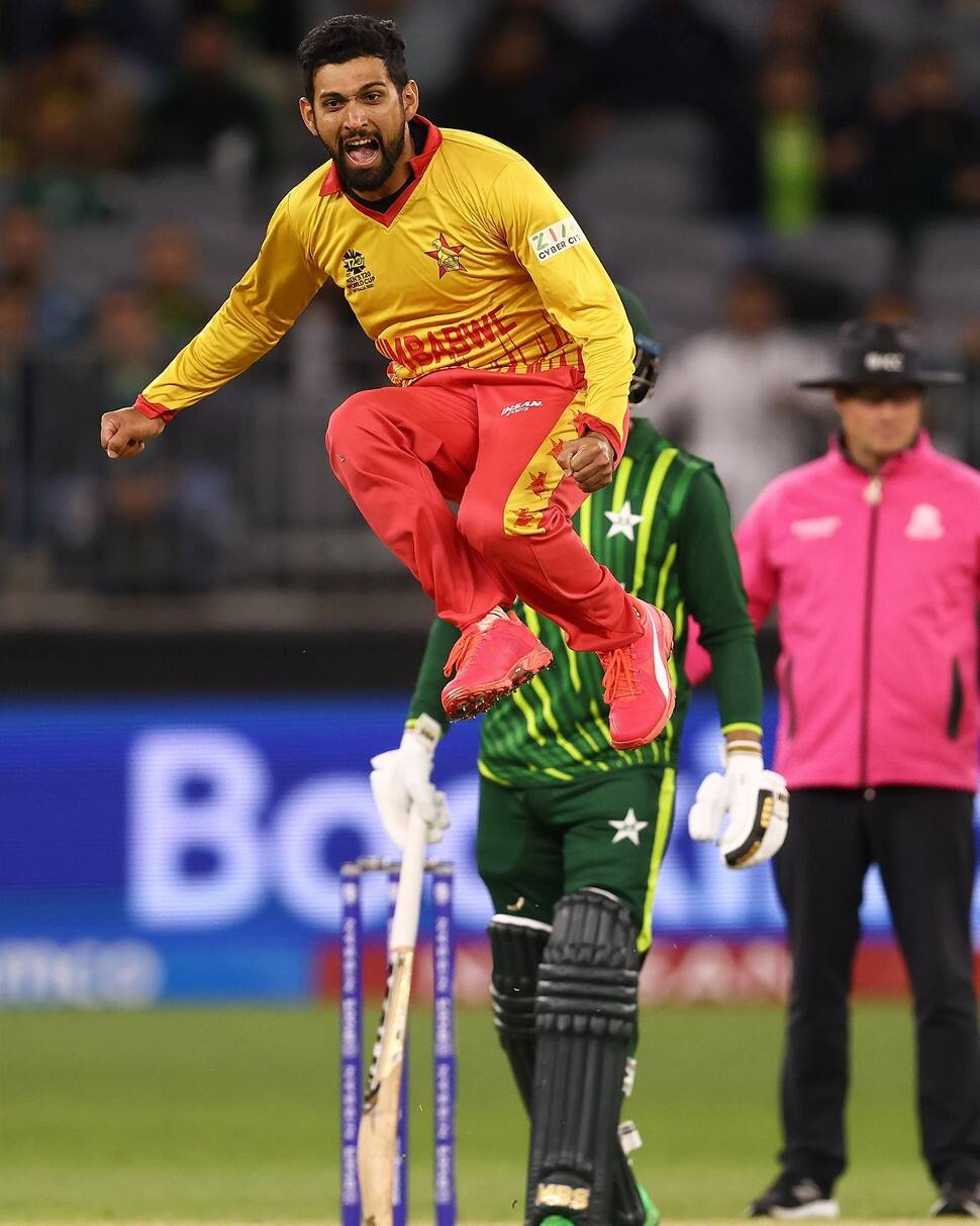 Zimbabwe all-rounder Sikandar Raza jumps with joy after claiming a wicket against Pakistan in their Super 12 game of the T20 World Cup 2022. (Source: Twitter)