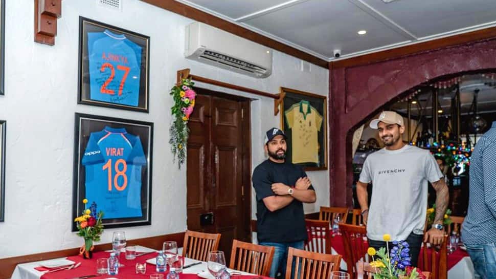 Team India captain Rohit Sharma with batter Deepak Hooda at the team dinner. The 'British Raj' restaurant for its chicken tikka, Kashmiri pilau and lamb rogan josh. (Source: Twitter)