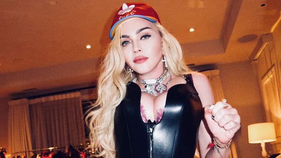 Madonna flashes her bust in nude corset, teases new risque video saying &#039;in the mood for love&#039; 