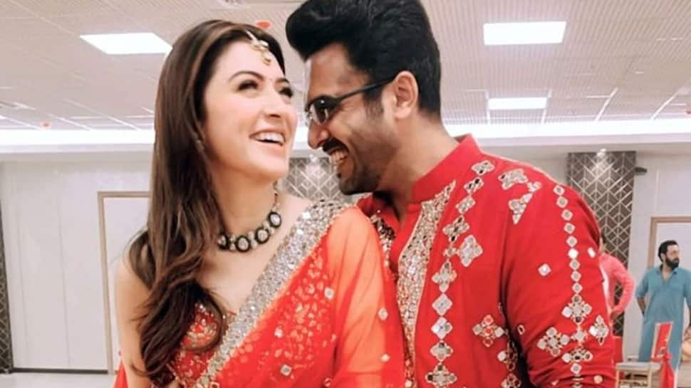 Hansika Motwani and businessman beau Sohael Khaturiya&#039;s pre-wedding functions begin with Mata Ki Chowki, couple twins in red - PICS