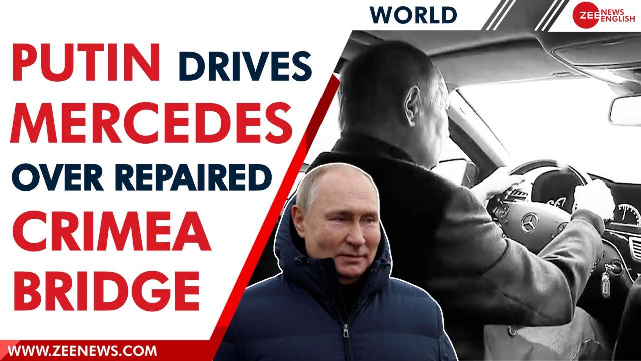 Vladimir Putin drives Mercedes over the repaired Crimea bridge after ...
