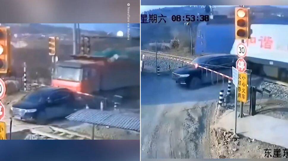 Scary moment for driver as truck pushes car towards fast-moving train, here’s what happened next: WATCH