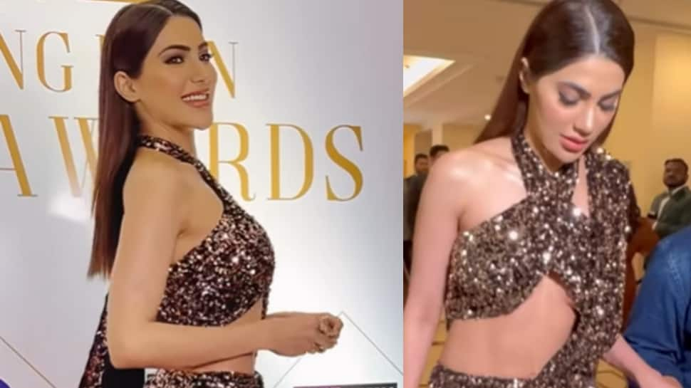 WATCH: Nikki Tamboli suffers oops moment in halter bra-high slit skirt, fans call her &#039;sasti Nora Fatehi&#039;