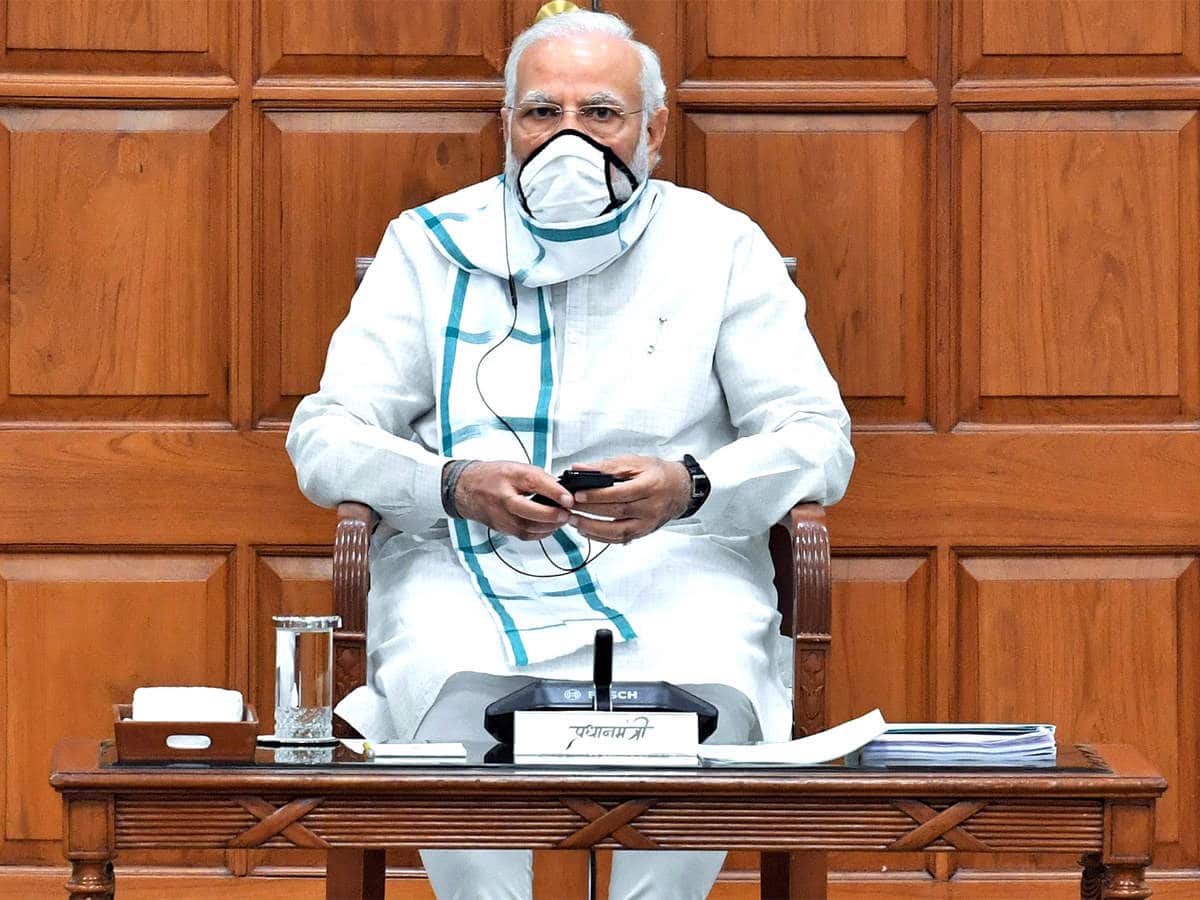 Prime Minister Narendra Modi arrives in Parliament wearing a mask Zee