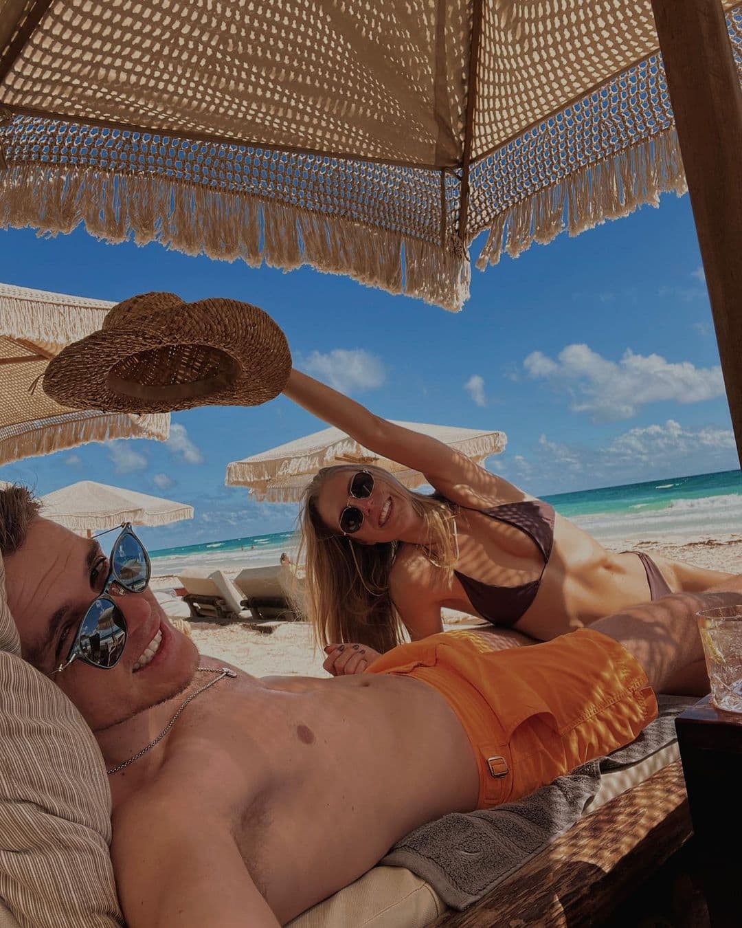 Couple poses on beach