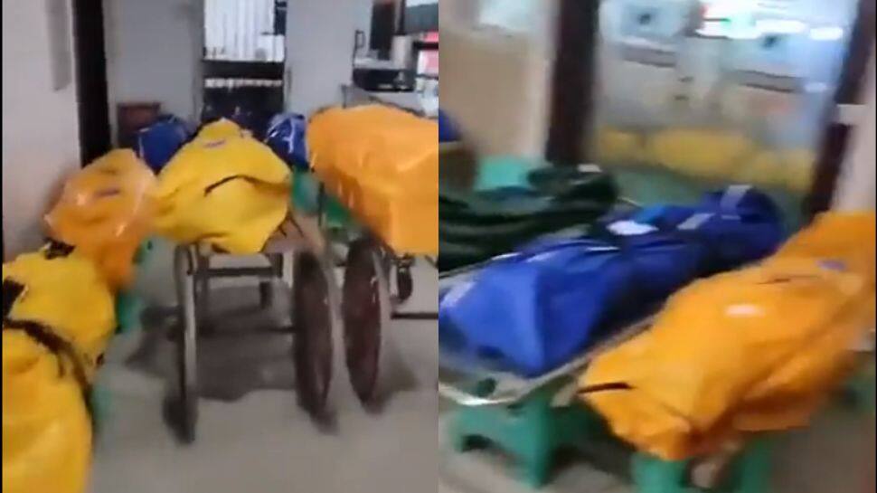 China&#039;s Covid crisis: Parking lot filled with makeshifts beds as hospitals overflow - Watch video