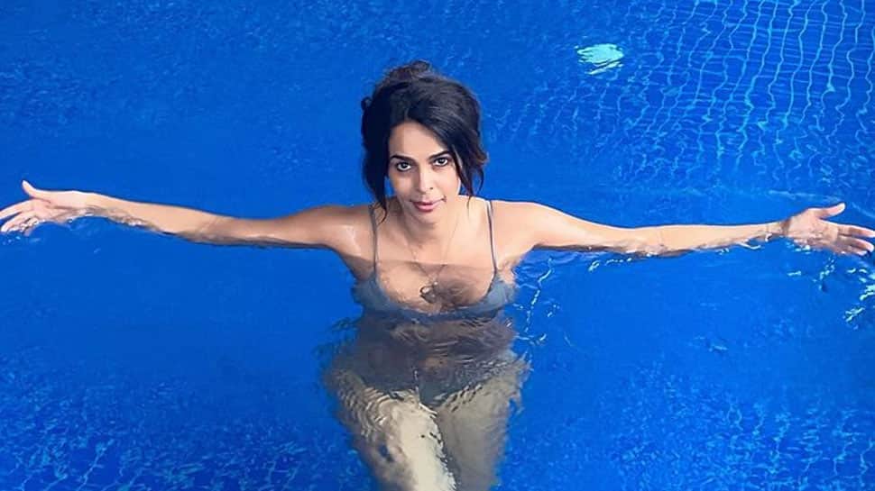 Mallika Sherawat&#039;s simmering hot pool pics rocking her ash grey bikini are worth a dekko!