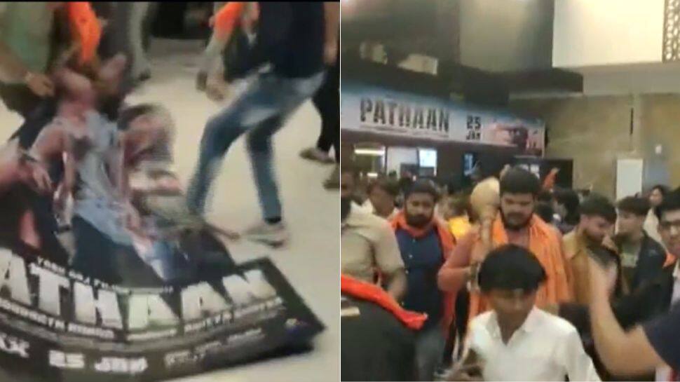 Bajrang Dal workers tear down Shah Rukh Khan&#039;s Pathaan movie posters in Ahmedabad: Watch