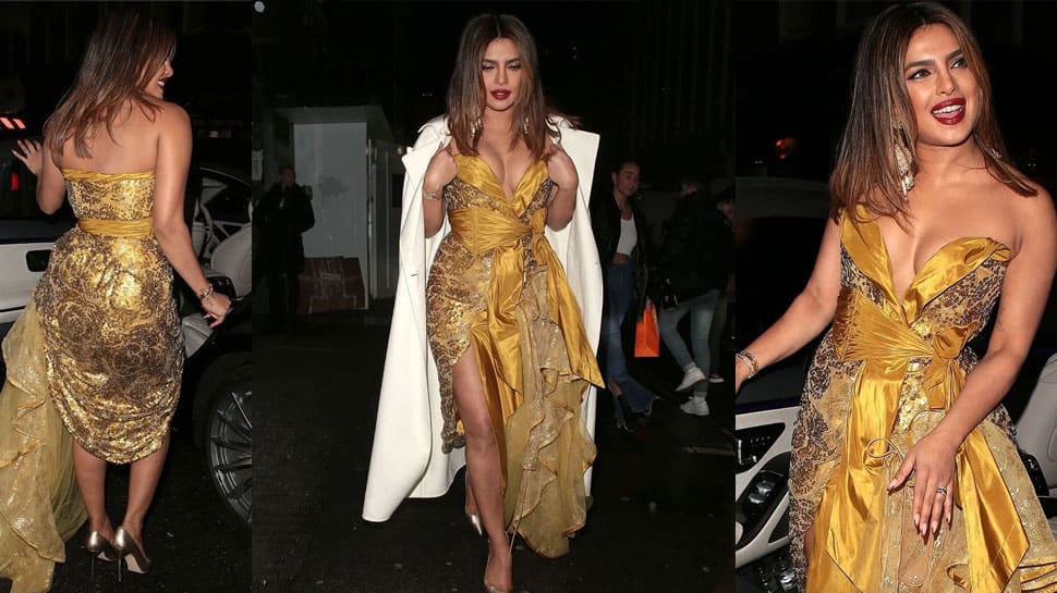 Priyanka Chopra Sexi Videos - Priyanka Chopra glitters in gorgeous golden dress with plunging neckline in  London, walks in like a boss lady - In Pics | News | Zee News