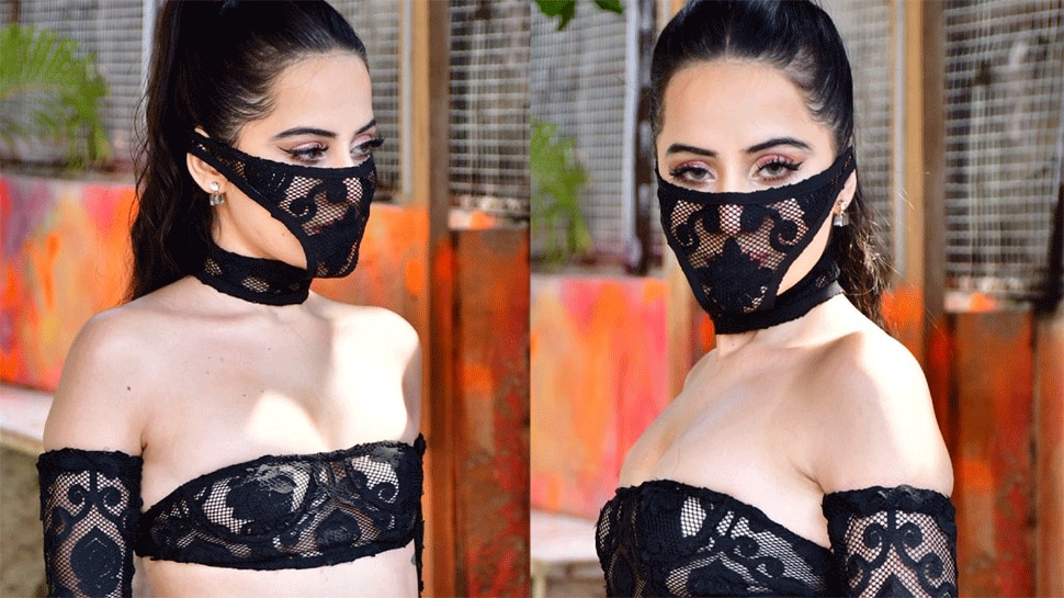 Urfi Javed Grabs Eyeballs In See Through Black Outfit Gets Trolled For Her Bizarre Mask 9471