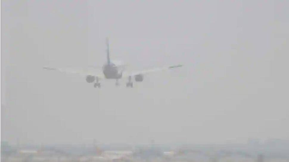 Delhi: Dense fog amid cold wave causes flight delays at IGI Airport