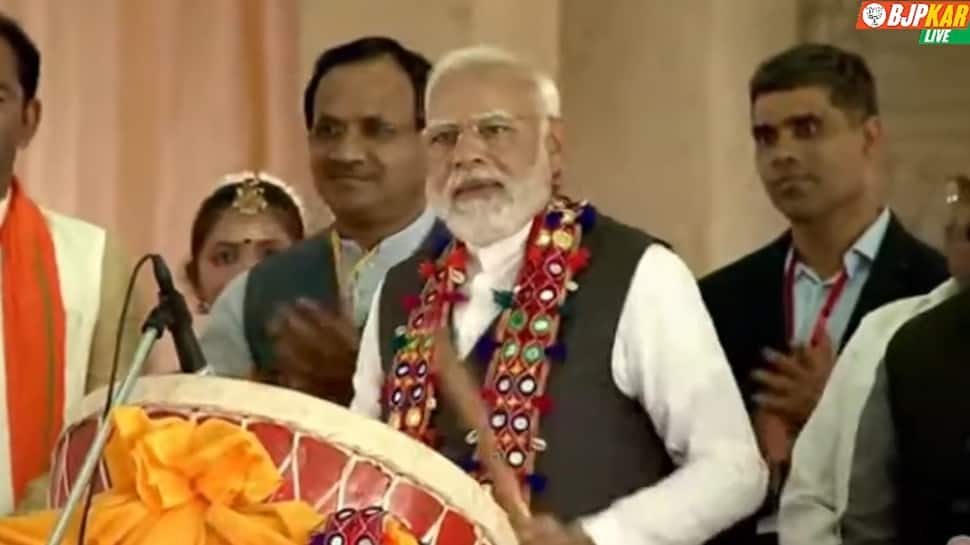 WATCH: Crowd cheers as PM Narendra Modi plays traditional drum during public rally in Karnataka