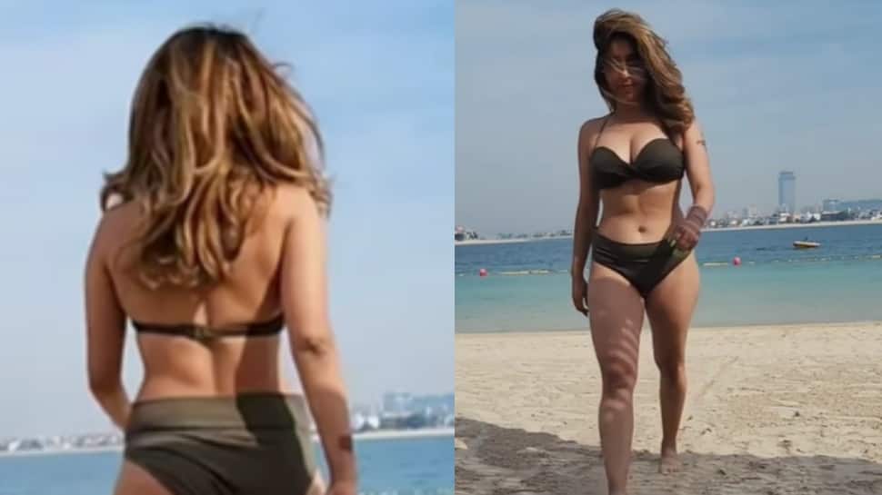 Neha Bhasin Flaunts her Curves in Gorgeous Bikini as she Takes a Walk by the Beach- Watch