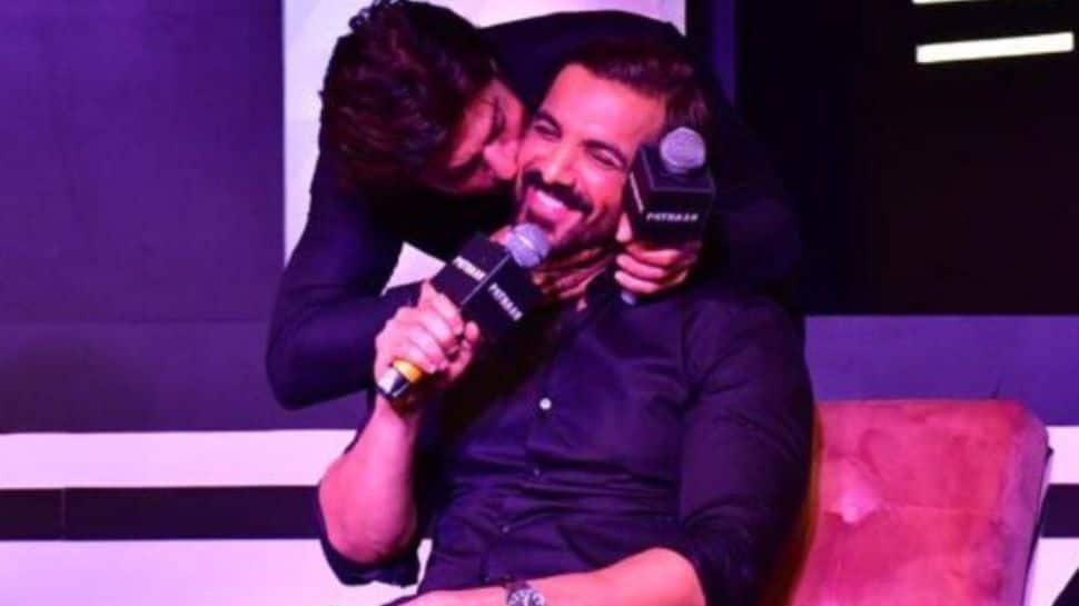 Shah Rukh Khan Kisses John Abraham During ‘Pathaan’ Press Conference, Says, ‘This is the first with John...’- Watch 