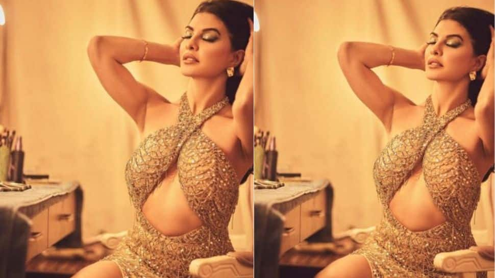 Jacqueline Fernandez sizzles in golden halter neck gown