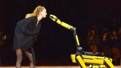 Watch: Robot Dog Helps Model Take Off Her Coat At Paris Fashion Show