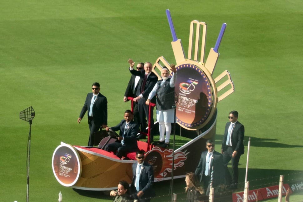 Prime Ministers Narendra Modi and Anthony Albanese take a lap of honour of the Narendra Modi Stadium in Ahmedabad. (Source: Twitter)