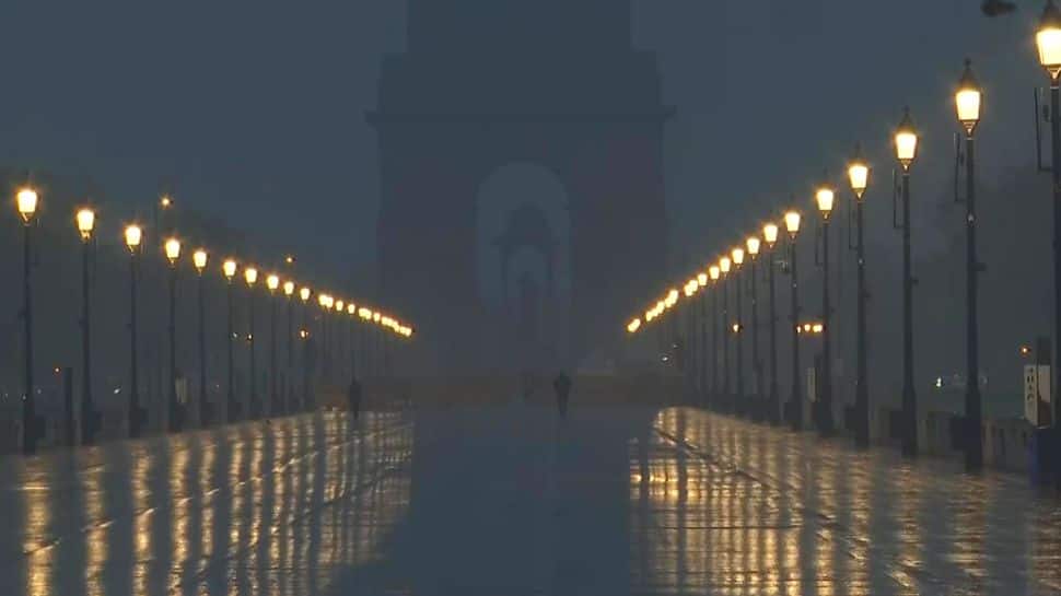 As Delhi Wakes Up To Light Rain, Cloudy Skies And Cold Winds Bring Relief From Heat