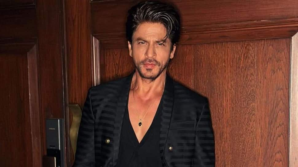 Shah Rukh Khan&#039;s New Jaw-Dropping Look In Black Suit Gets A Swooning Reaction From Deepika Padukone