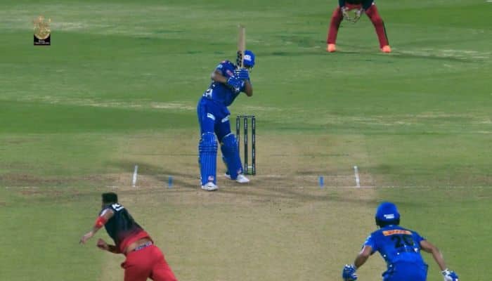 MS Dhoni Style: MI&#039;s Tilak Verma Hits Last Ball Six vs RCB With A Helicopter Shot, Video Goes Viral - Watch