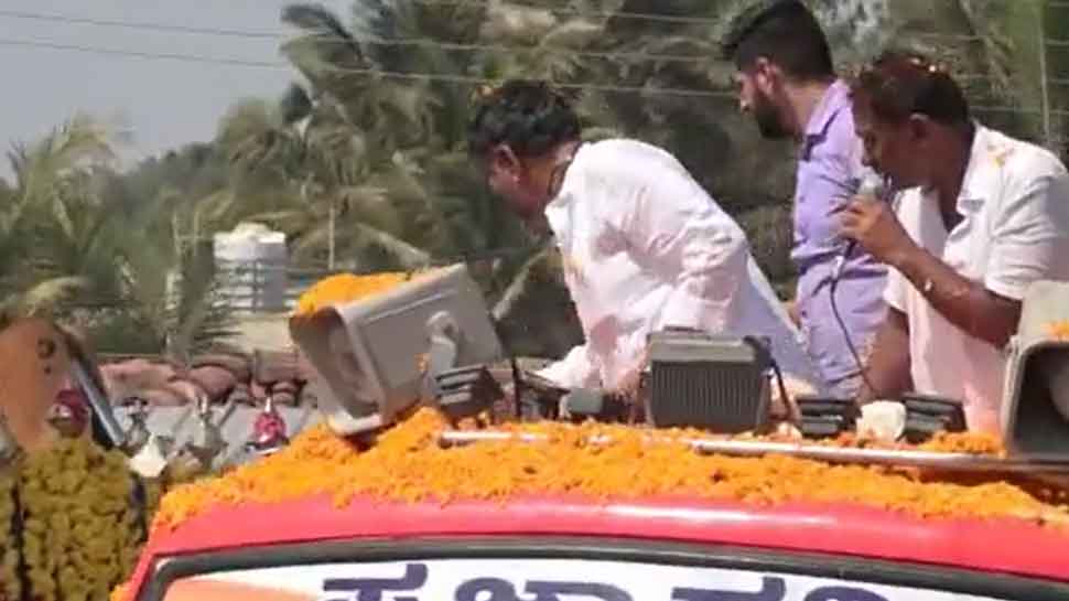 WATCH: Karnataka Congress Chief D K Shivakumar Throws Currency Notes During Poll Campaign, Booked