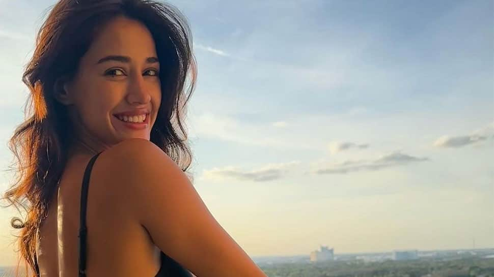 Disha Patani Oozes Glamour In Latest Photos, Flaunts Her Toned Back, Bestie Mouni Roy Reacts