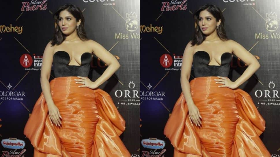 Bhumi wore a strapless black and orange dress