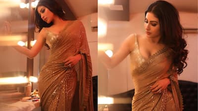 Mouni Roy stuns in a golden glittery saree in the latest set of pictures
