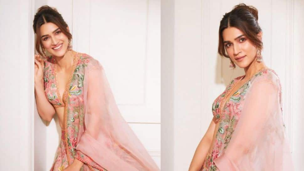 Kriti in peach pink lehenga