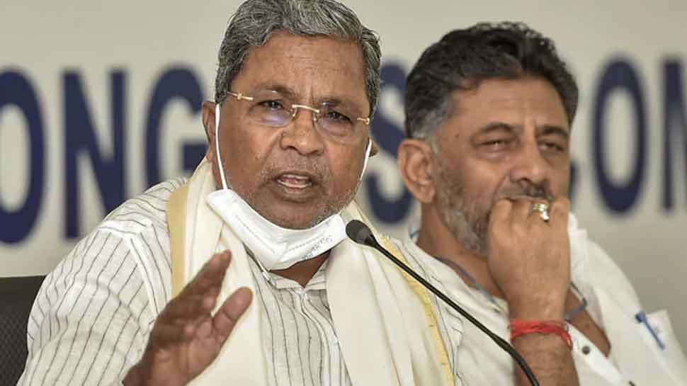 Karnataka CM Suspense Continues; Siddaramaiah Tight-Lipped, DK Shivakumar Says &#039;Won&#039;t Blackmail&#039; 