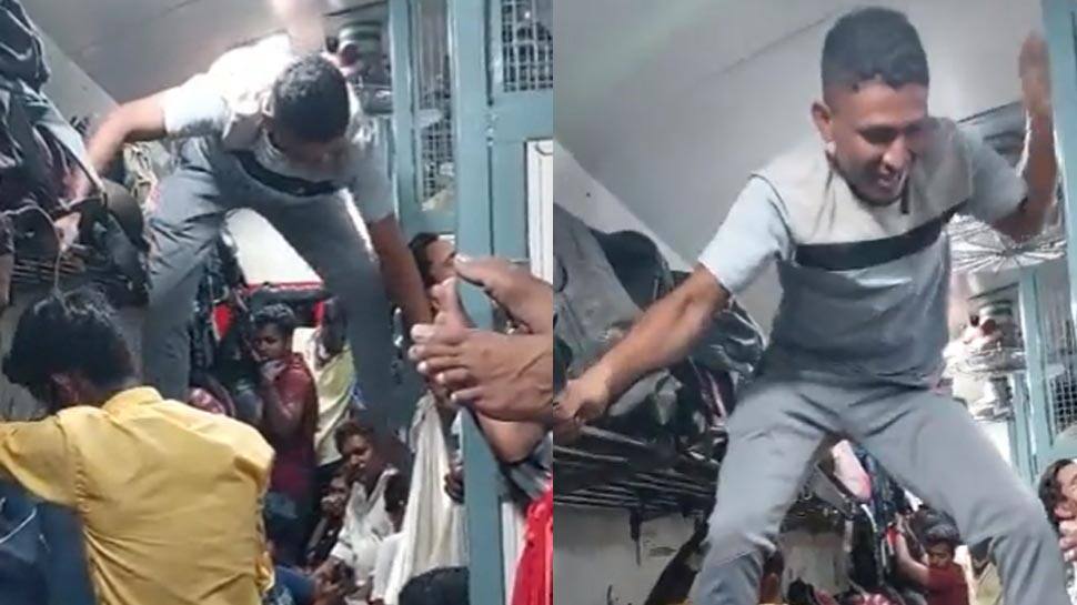 Man’s Gymnastics To Travel Through Crowded Train Compartment Divide Twitter