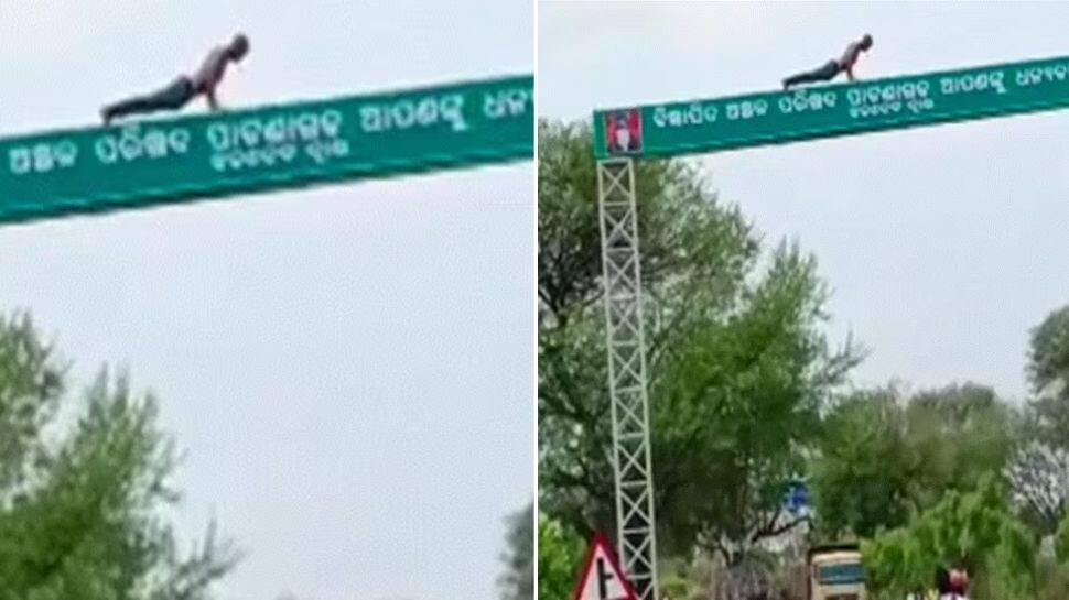 Watch: Man Performs Push-ups On High Signboard In Viral Video, Internet Reacts