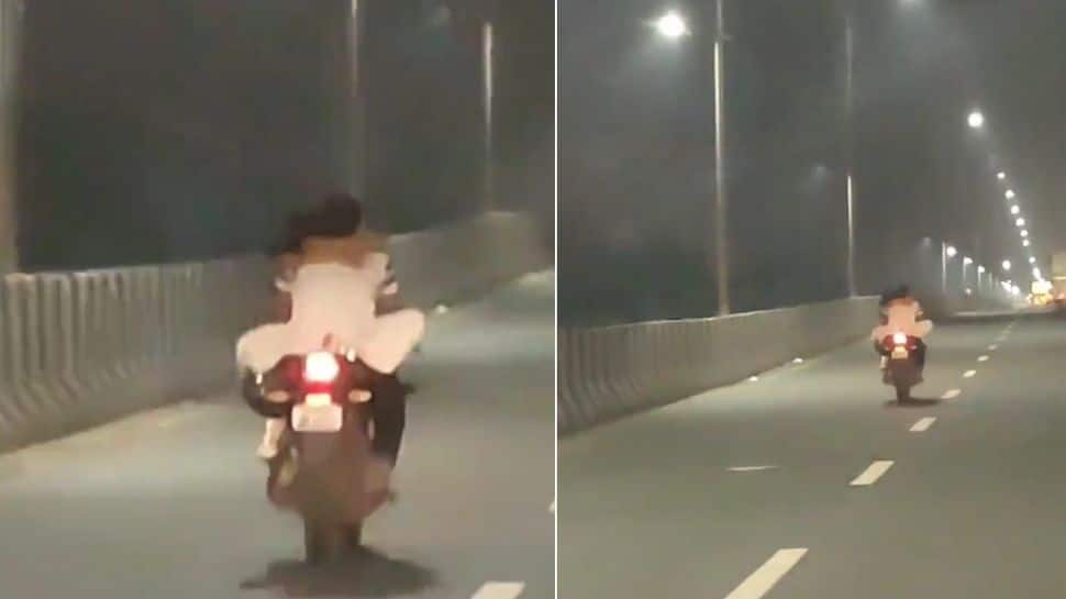 Watch: Couple Kissing On Bike In Delhi NCR Goes Viral, Netizens Reacts