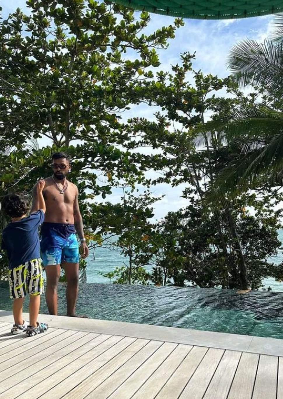 Gujarat Titans captain Hardik Pandya with son Agastya in Phuket. Pandya will be next seen in action in T20 series against West Indies next month. (Source: Instagram)