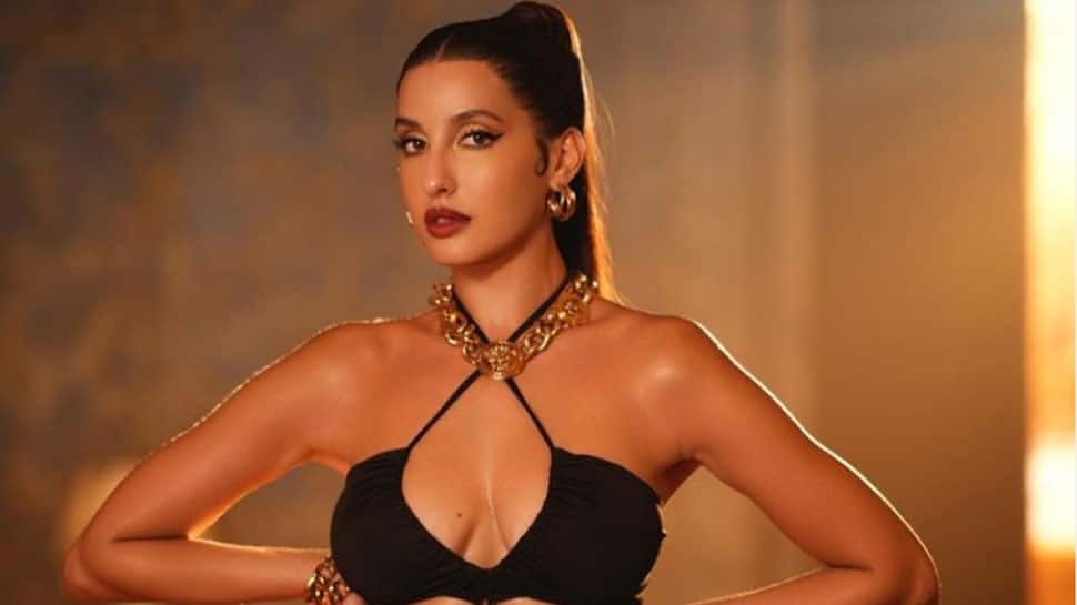 Nora Fatehi Oozes Hotness In Black Cut-Out Dress, Drops Sensual Video |  People News | Zee News