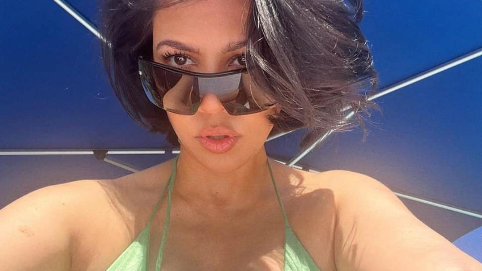Kourtney Kardashian Looks Stunning In Green Bikini As She Flaunts Her Baby Bump