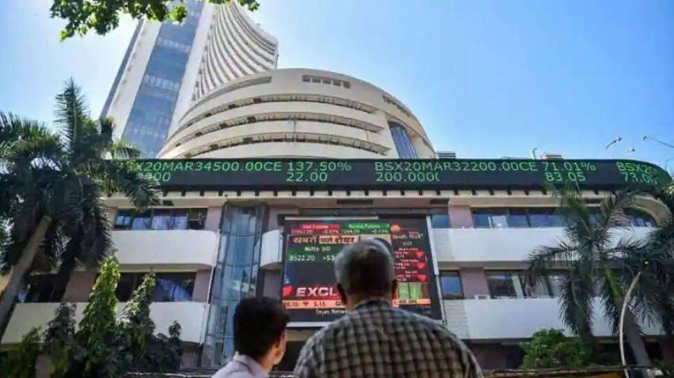 Indian Shares Gain On HDFC Life, Sensex Rises 0.23% To 63,112.55