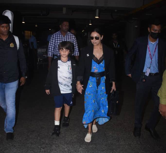 SRK returns to Mumbai with wife, son