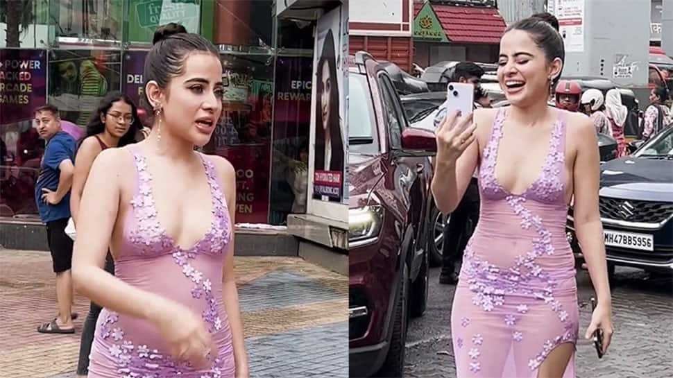 Urfi Javed Grabs Eyeballs In Purple Sheer Outfit, Gives Money To Poor Kid - Watch