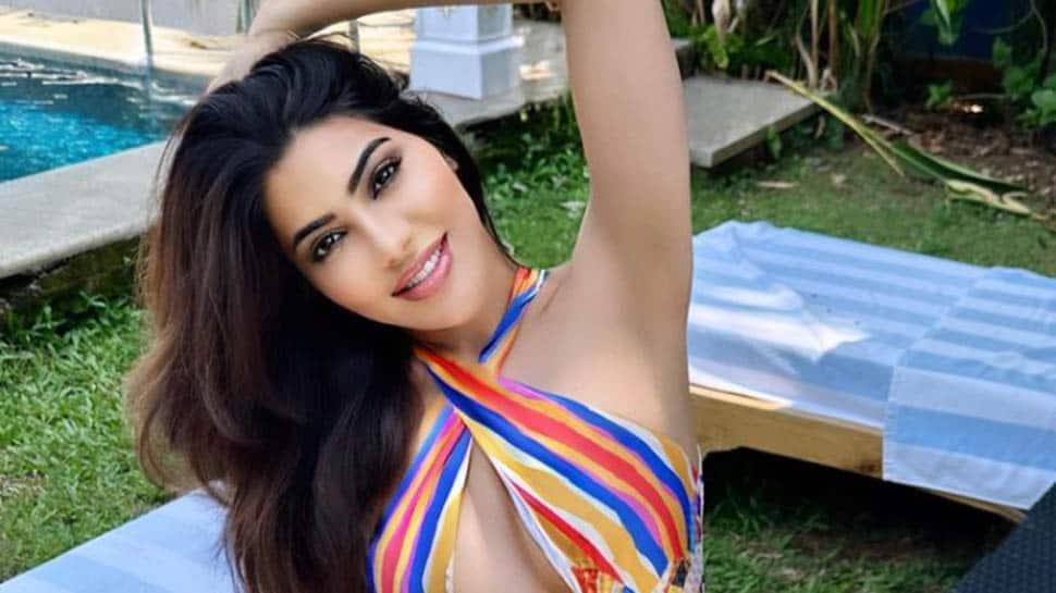 Nikki Tamboli Soars Mercury In Yellow Bikini, Leaves Fans Gasping For Breath - Watch