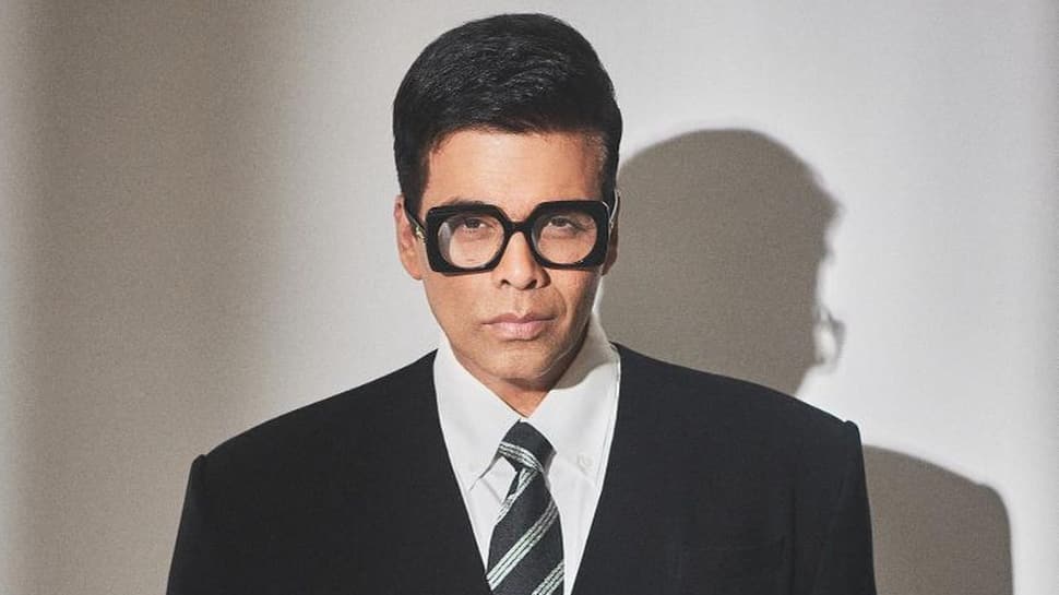 Karan Johar Ditches Blingy Clothes At Bawal Screening, Dons Simple Black Suit