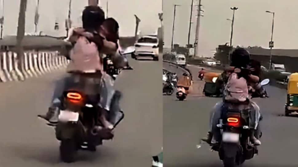 Couple Romances On Moving Bike In Delhi, Gets ‘11000 Ka Shagun’ From Police - Watch