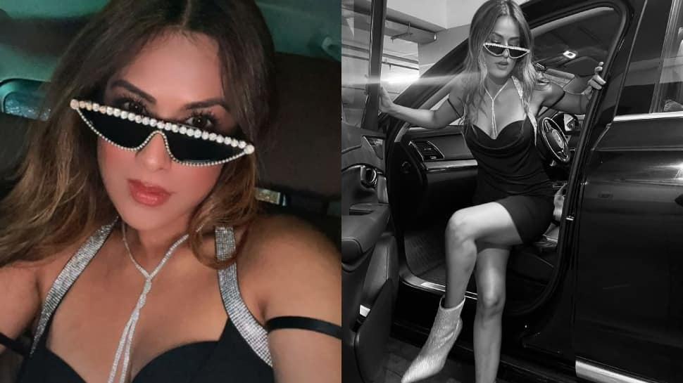 Nia Sharma Turns Heads In Plunging Black Dress, Wears Disco Sunglasses - Watch