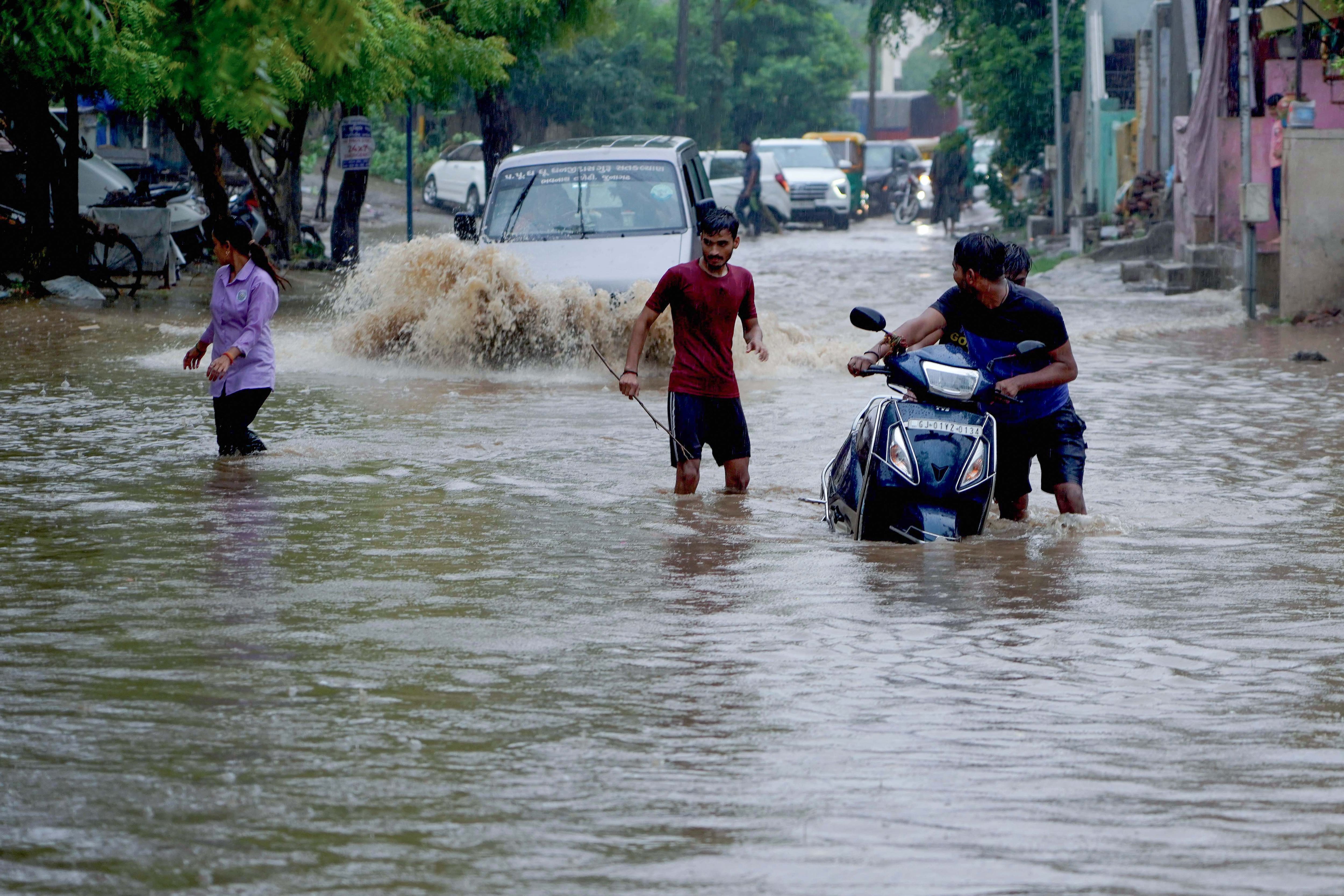 Heavy Rainfall In Gujarat; Rainwater Entres Into Houses, Hits Traffic
