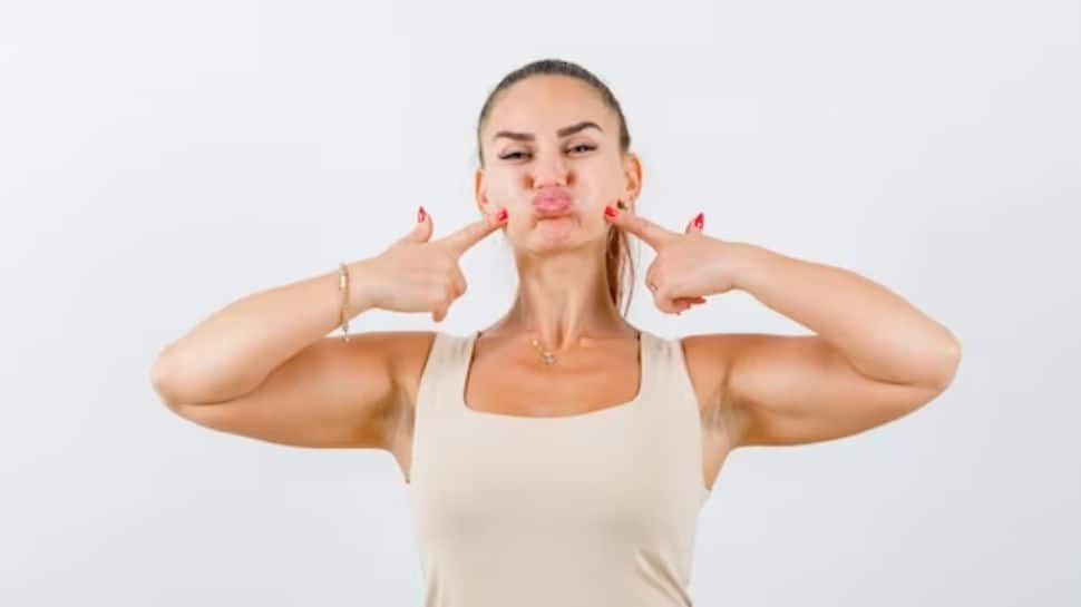 Face Yoga Exercise: Cheek Inflation