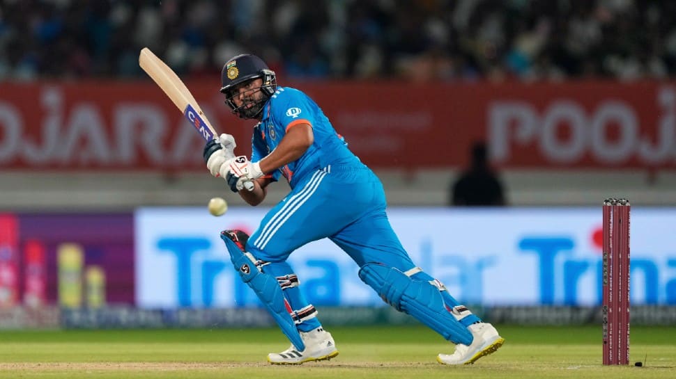 Team India captain Rohit Sharma has become the second batter after Chris Gayle to smash 550 sixes in international cricket en route to scoring 81 off 57 balls in the 3rd India vs Australia ODI in Rajkot. Rohit now has 551 sixes as compared to Gayle's 553 sixes. (Photo: AP)