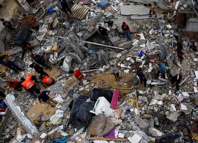 Israel-Hamas War: People Comduct Search At Damaged Sites In Gaza