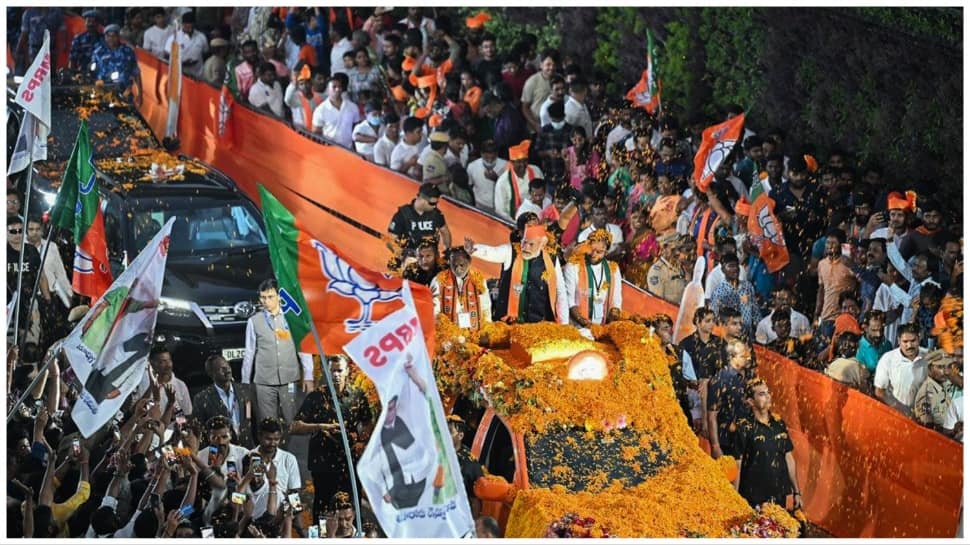 Watch- PM Modi Showered With Flower Petals Throughout A Roadshow In Hyderabad